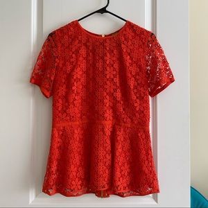 Orange lace peplum top
